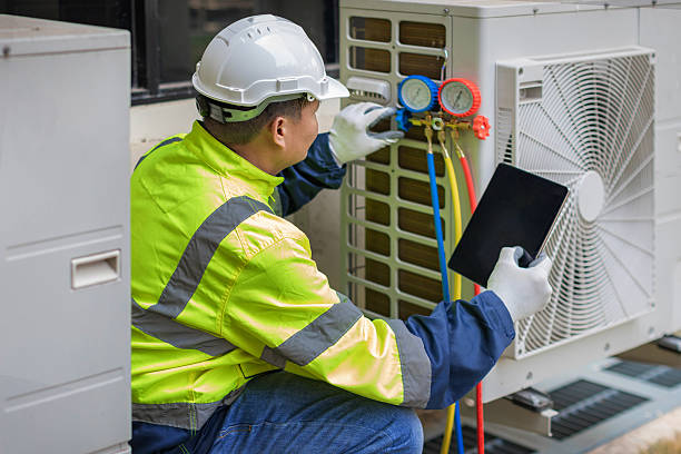 Professional Ac Installation technician working in Whitman, MA